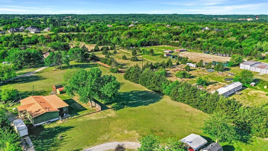 Tbd Ridge Road Pottsboro, TX 75076 - Photo 4 of 13 a view of a garden with a lake