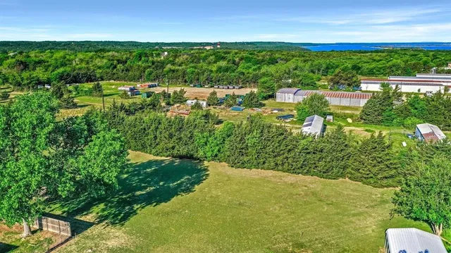 a view of a lake with a building in the background