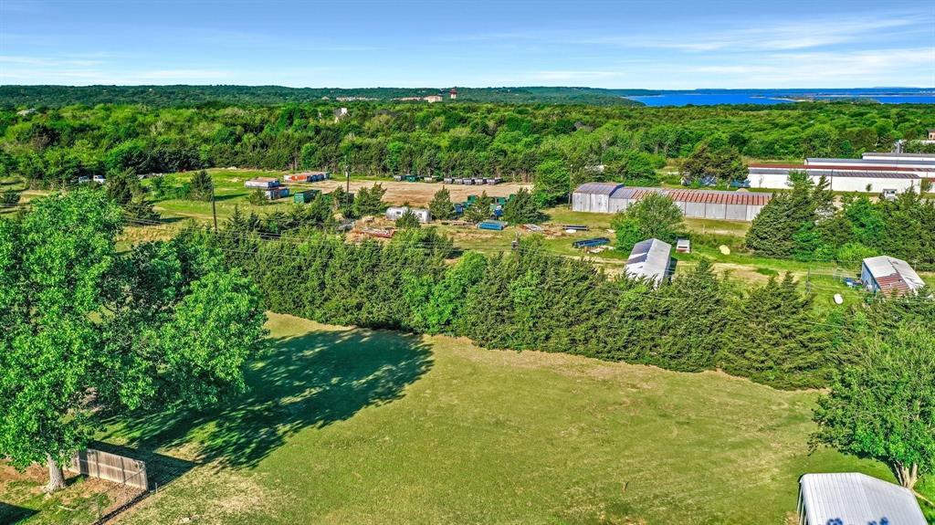 Tbd Ridge Road Pottsboro, TX 75076 - Photo 5 of 13 a view of a lake with a building in the background
