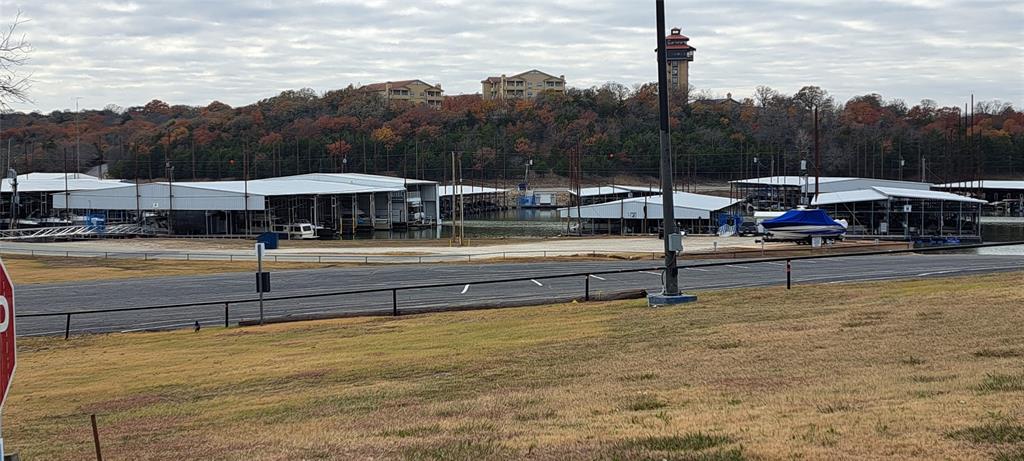 Tbd Ridge Road Pottsboro, TX 75076 - Photo 10 of 13 a view of swimming pool with outdoor seating and trees in the background