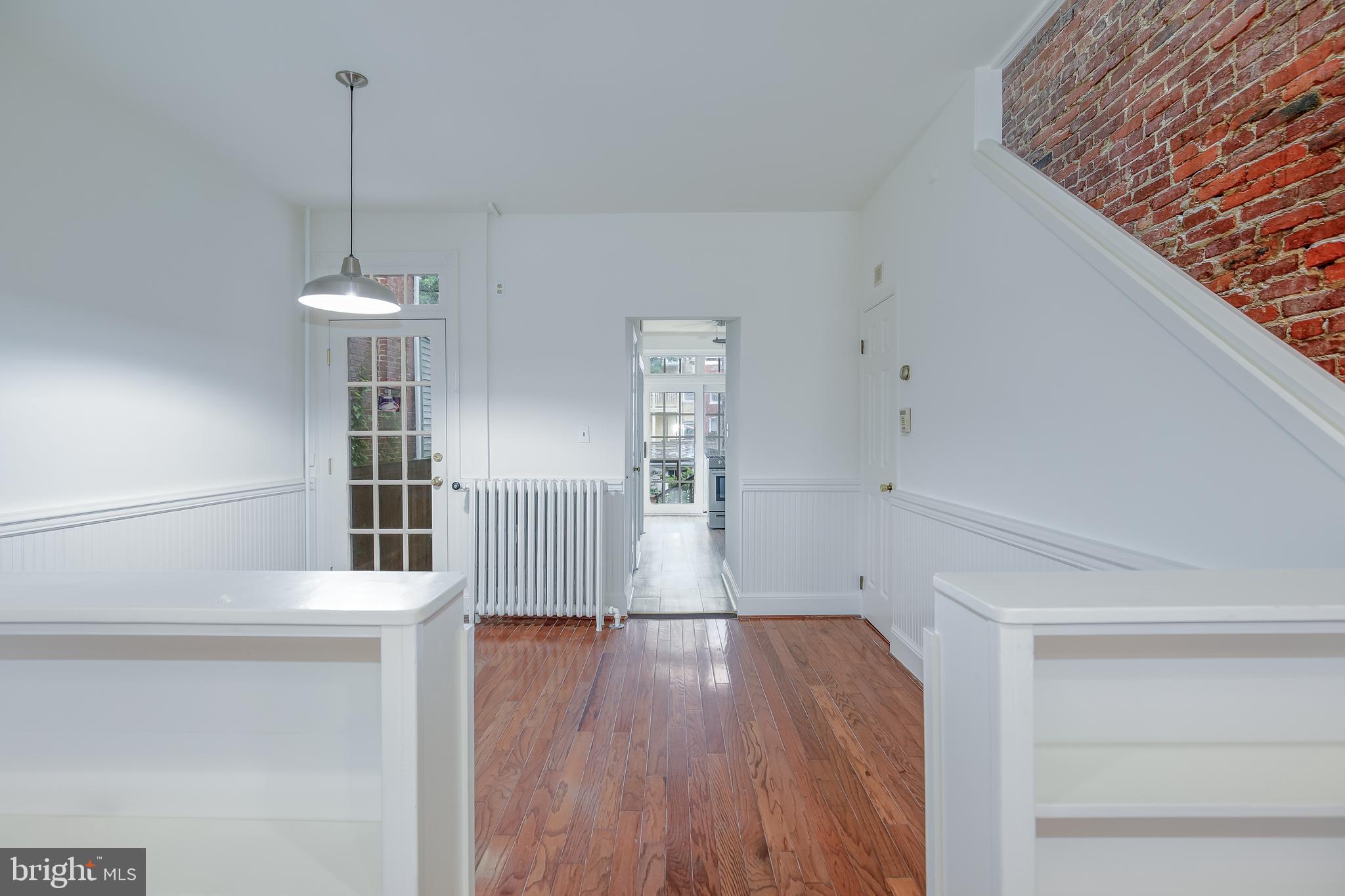 323 14th Street Northeast Washington, DC 20002 - Photo 14 of 41 a view of a room with wooden floor and staircase