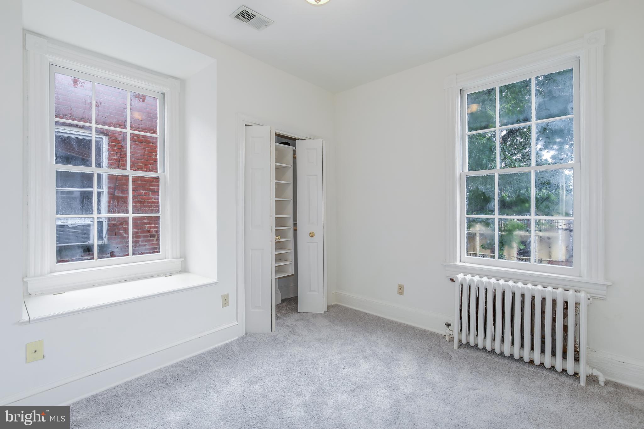 323 14th Street Northeast Washington, DC 20002 - Photo 24 of 41 an empty room with windows