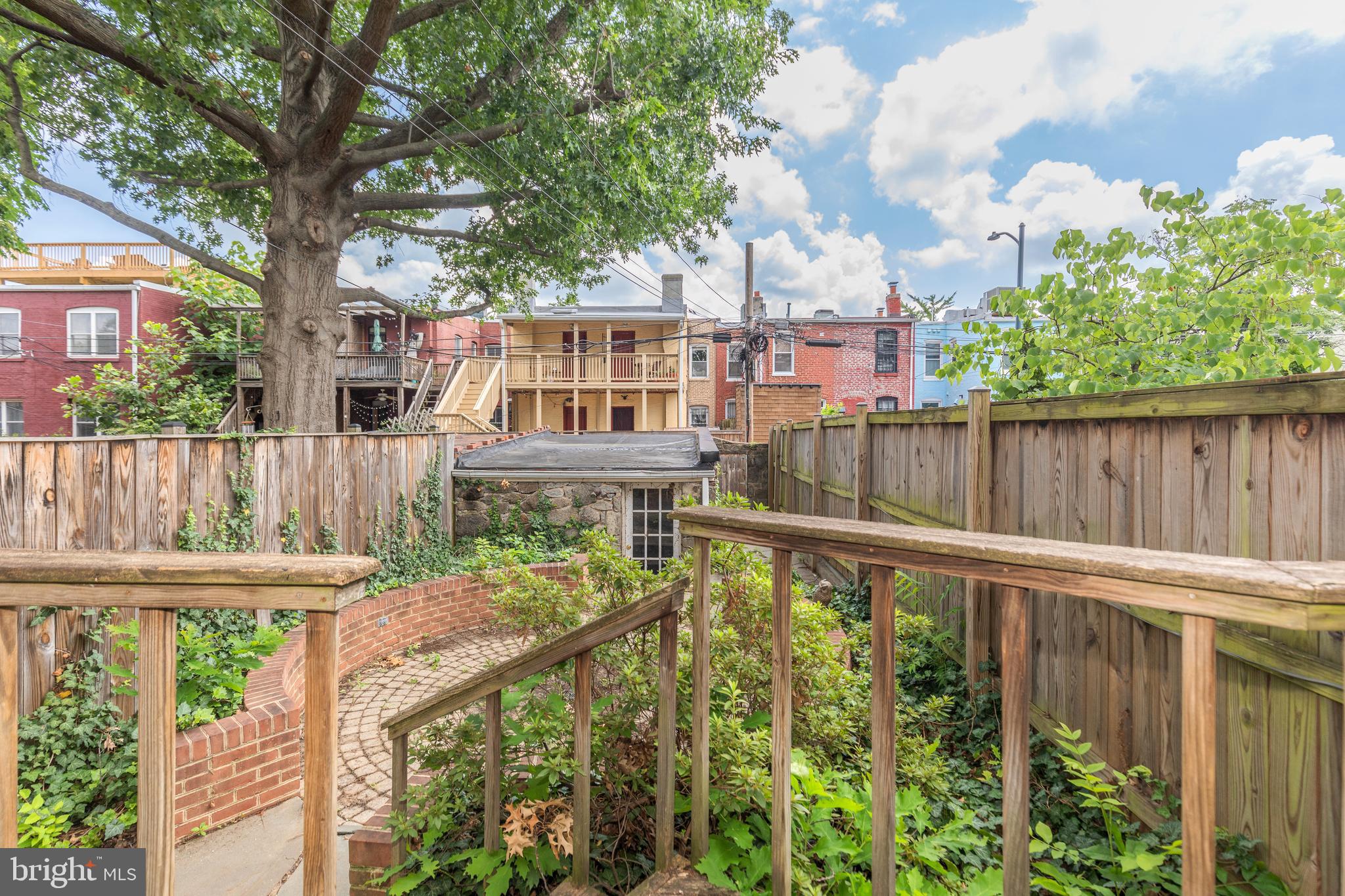 323 14th Street Northeast Washington, DC 20002 - Photo 36 of 41 a view of a house with backyard and sitting area