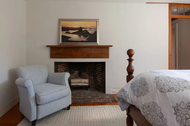 a bedroom with a bed and a closet