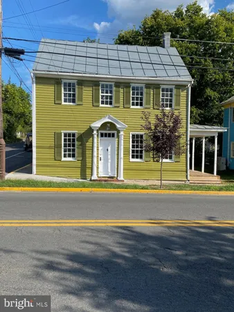 a front view of a house having yard