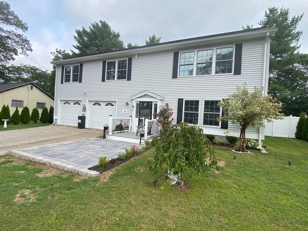 15 Jackson Road Webster, MA 01570 - Photo 1 of 31 front view of a house with a yard