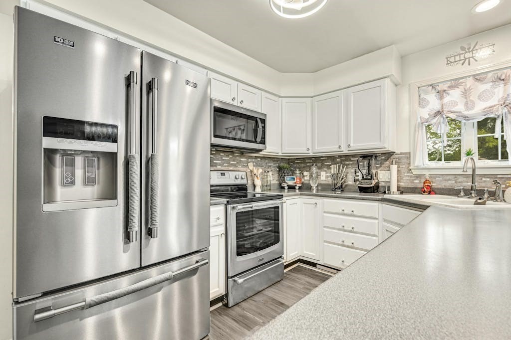 15 Jackson Road Webster, MA 01570 - Photo 3 of 31 a kitchen with granite countertop a refrigerator stove and sink