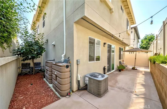a view of balcony with furniture