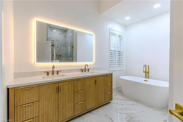 $1,795,000 | 9217 Troon Lakes Drive, Naples, FL 34109