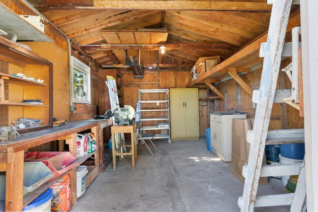 a view of a wooden deck with a yard