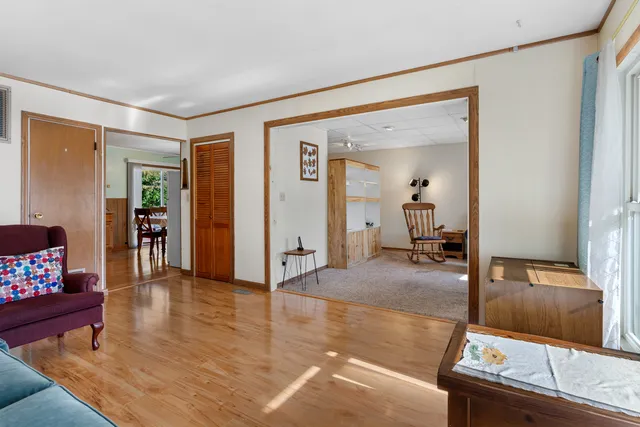 a view of a livingroom with furniture and front door