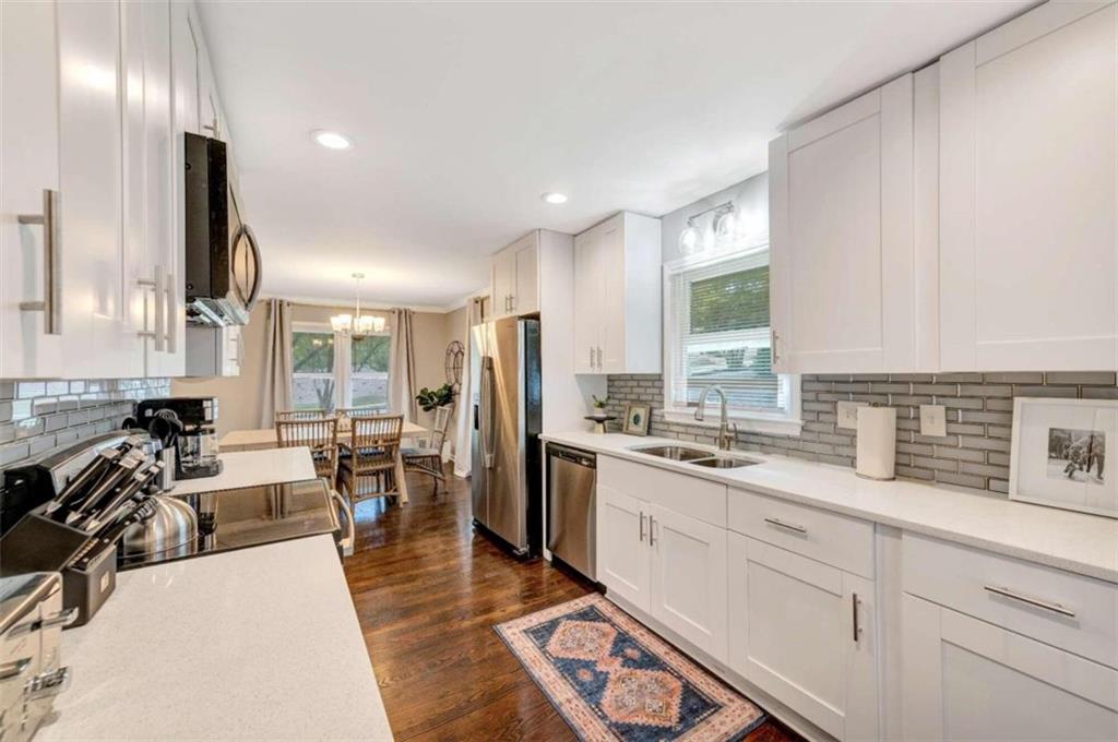 1376 Sandtown Road Southwest Marietta, GA 30008 - Photo 14 of 25 a very nice looking room with a large window and furniture