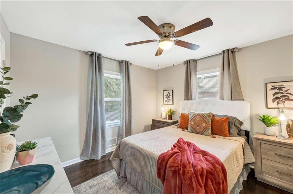 1376 Sandtown Road Southwest Marietta, GA 30008 - Photo 17 of 25 a bedroom with a bed and a window