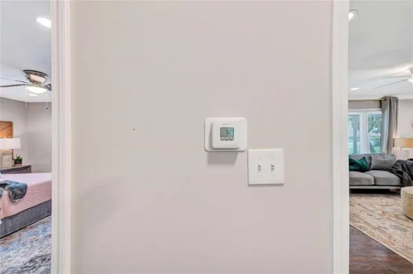 a view of a bedroom with a bed