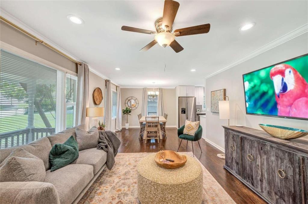 1376 Sandtown Road Southwest Marietta, GA 30008 - Photo 3 of 25 a living room with furniture and wooden floor