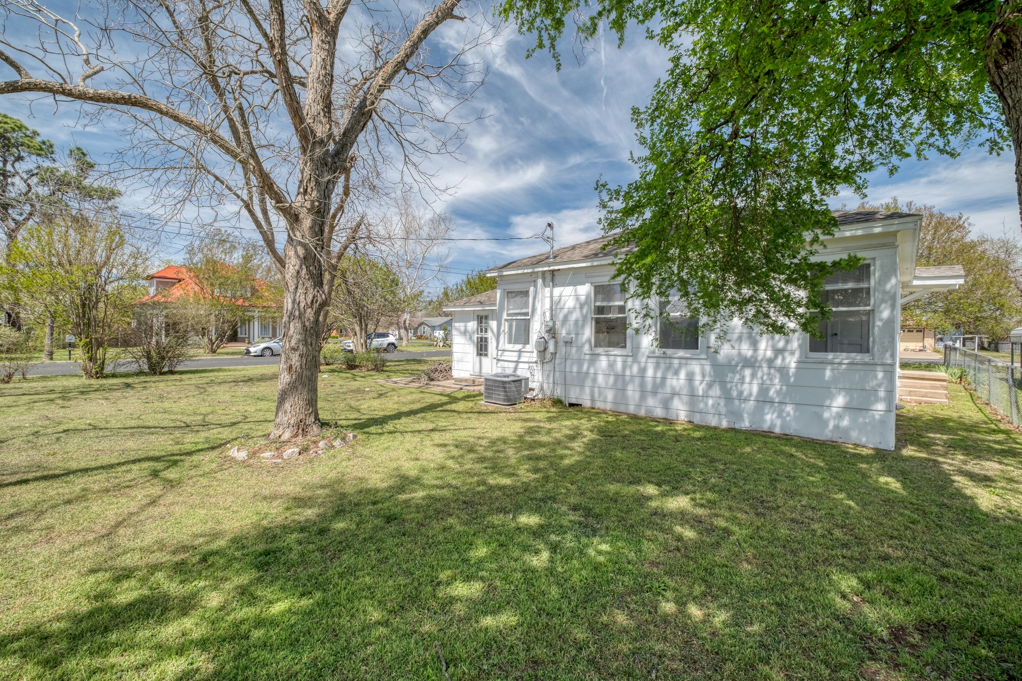 710 North Ave H Elgin, TX 78621 - Photo 25 of 25 View of back of the home from the southeast corner of the yard.