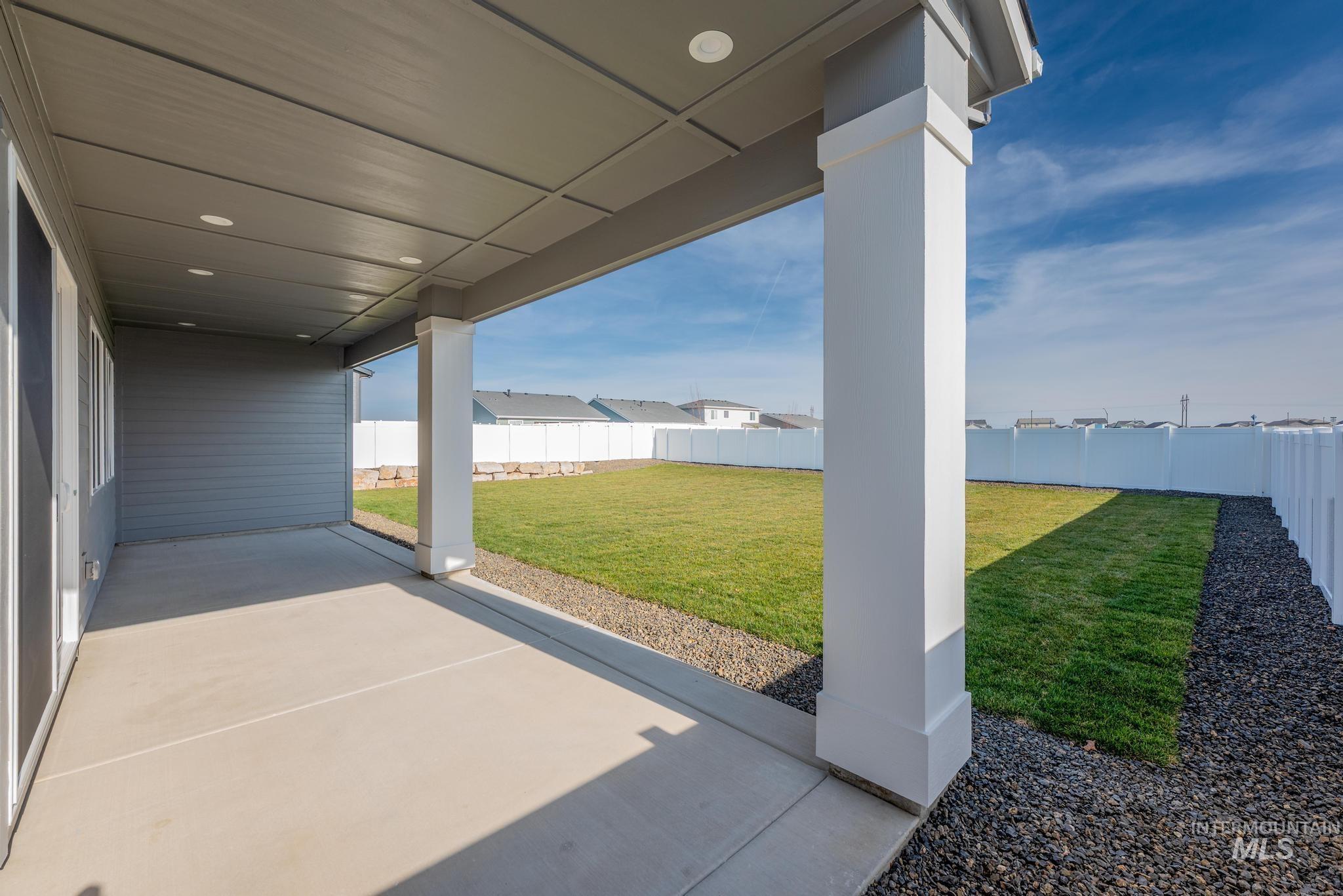 15232 Steel Cloud Avenue Caldwell, ID 83607 - Photo 28 of 33 Fenced backyard featuring a patio