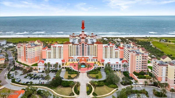 a view of swimming pool with outdoor seating