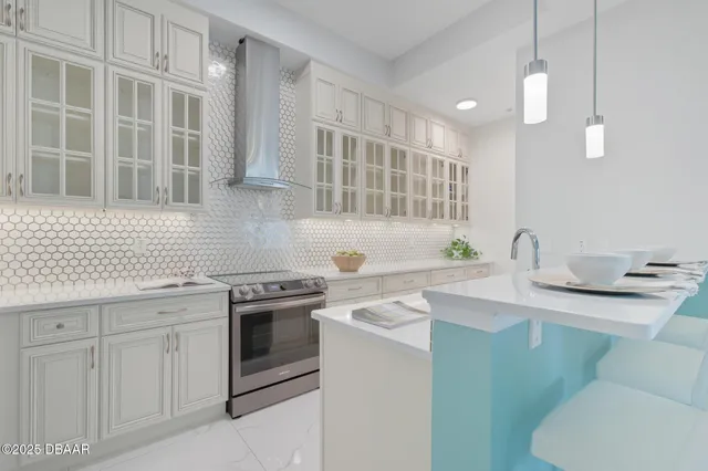 a kitchen with a stove and a sink