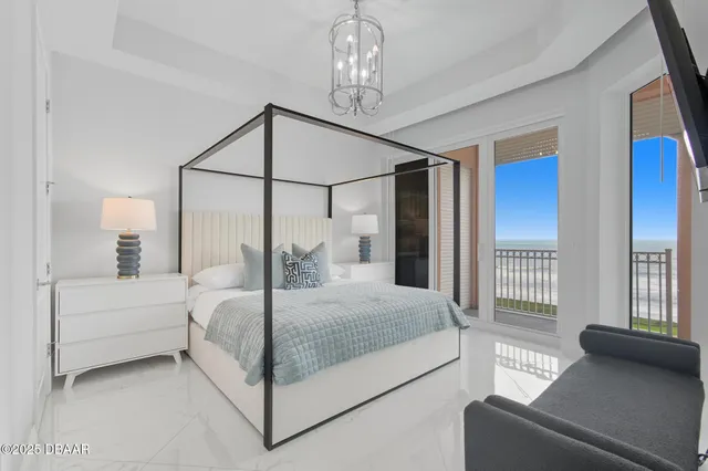 a view of a bathroom with washing machine and washing machine