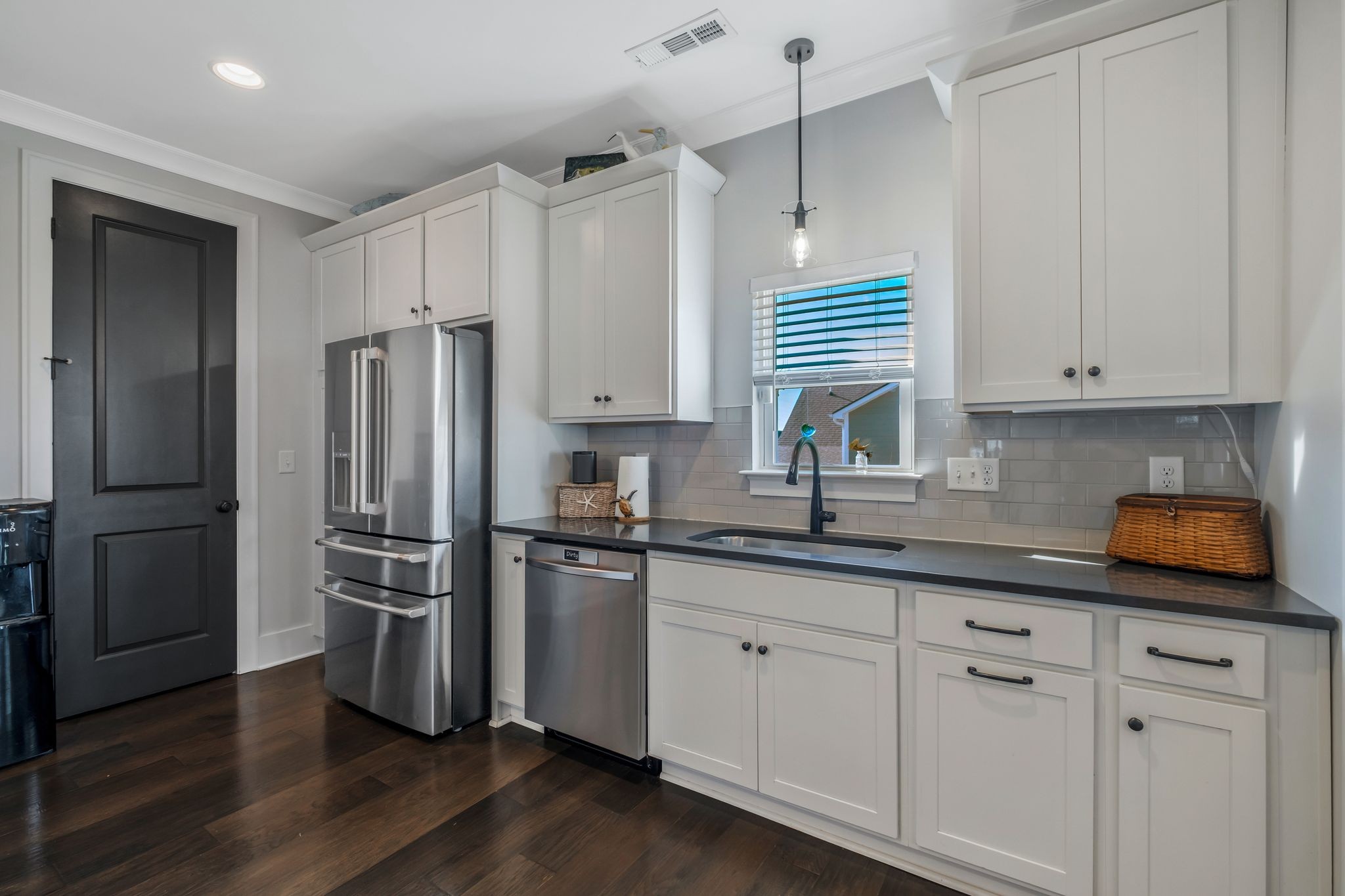 300 Croft Way Mount Juliet, TN 37122 - Photo 12 of 70 a kitchen with white cabinets and stainless steel appliances