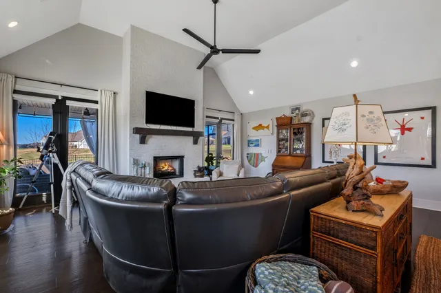 a bedroom with a bed and a table