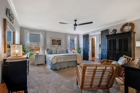 a view of living room with furniture and floor to ceiling window