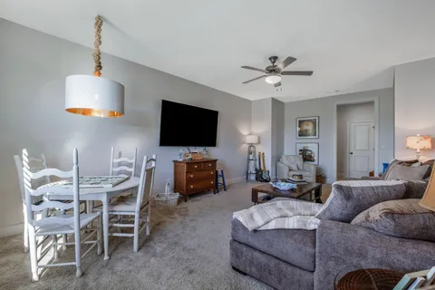 an aerial view of a house with a swimming pool
