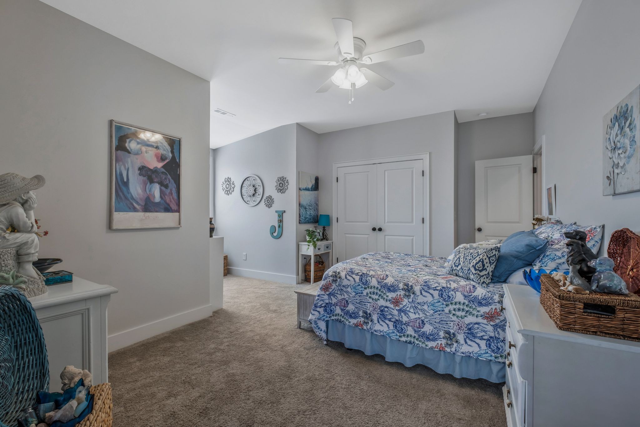 300 Croft Way Mount Juliet, TN 37122 - Photo 53 of 70 a bedroom with a bed and a chandelier