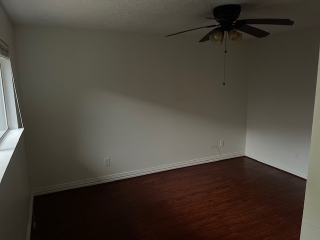 8226 Forest Point Drive Humble, TX 77338 - Photo 6 of 12 a view of a small space with wooden floor and a window