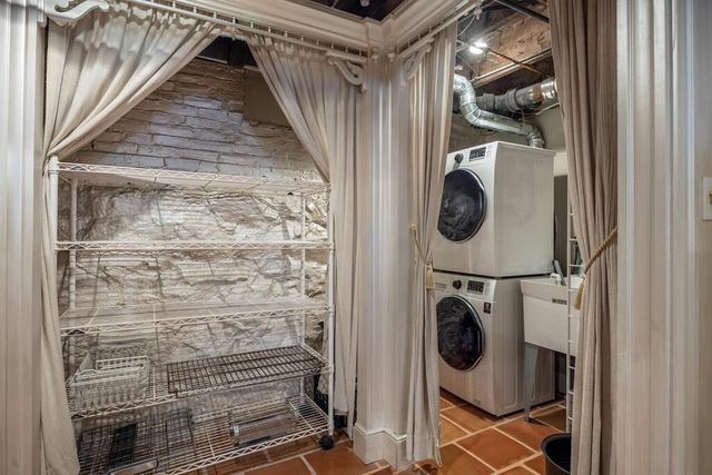 a view of a storage room with wooden floor