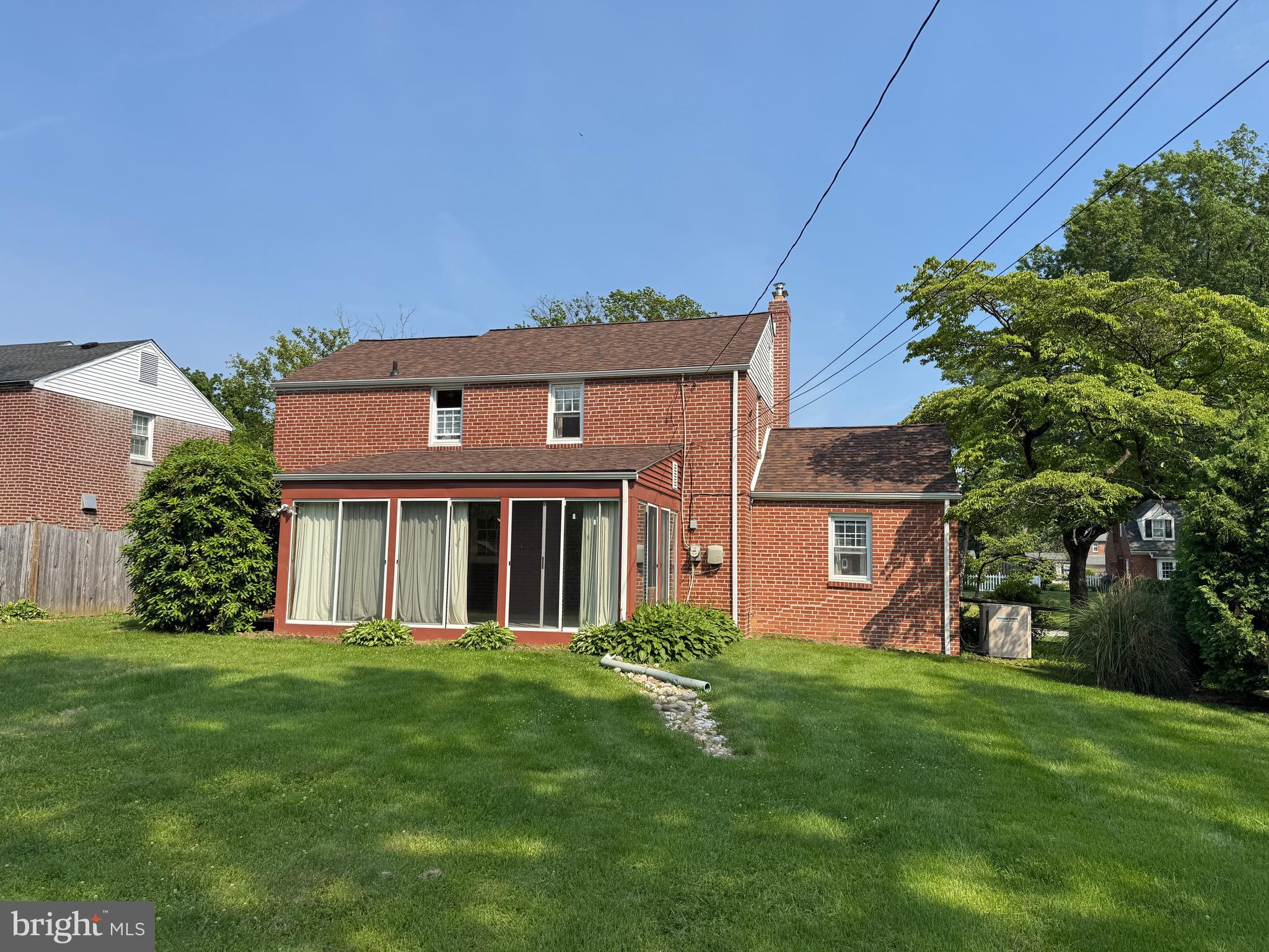 407 Willow Road Oreland, PA 19075 - Photo 23 of 30 front view of a house with a yard