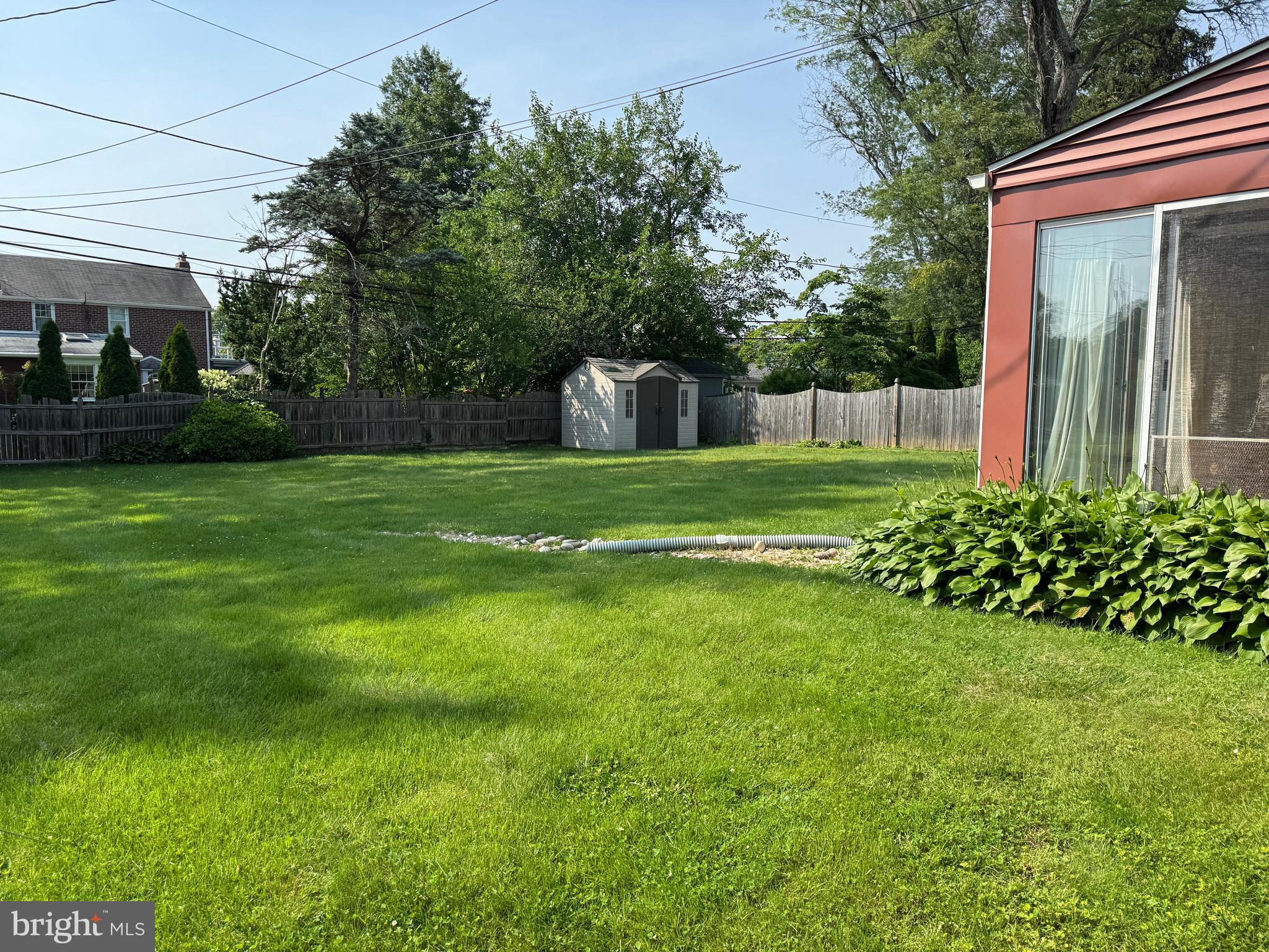 407 Willow Road Oreland, PA 19075 - Photo 24 of 30 a front view of a house with a yard