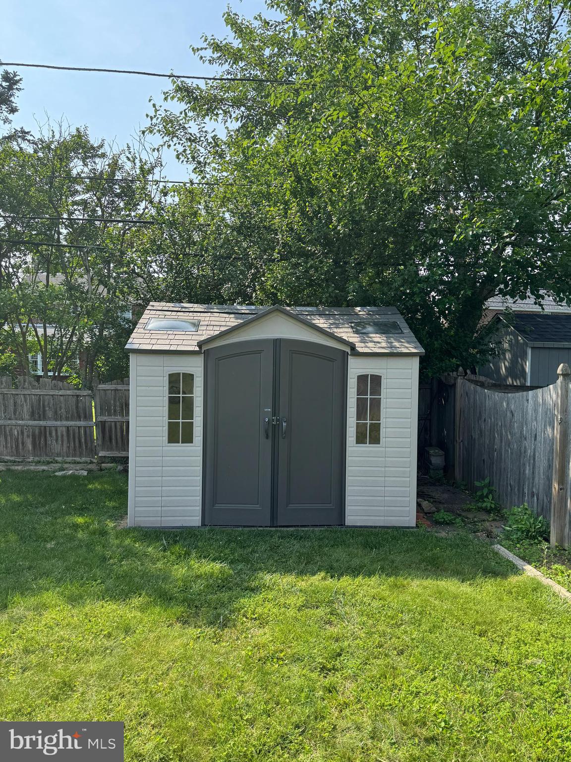 407 Willow Road Oreland, PA 19075 - Photo 25 of 30 a backyard of a house with lots of green space