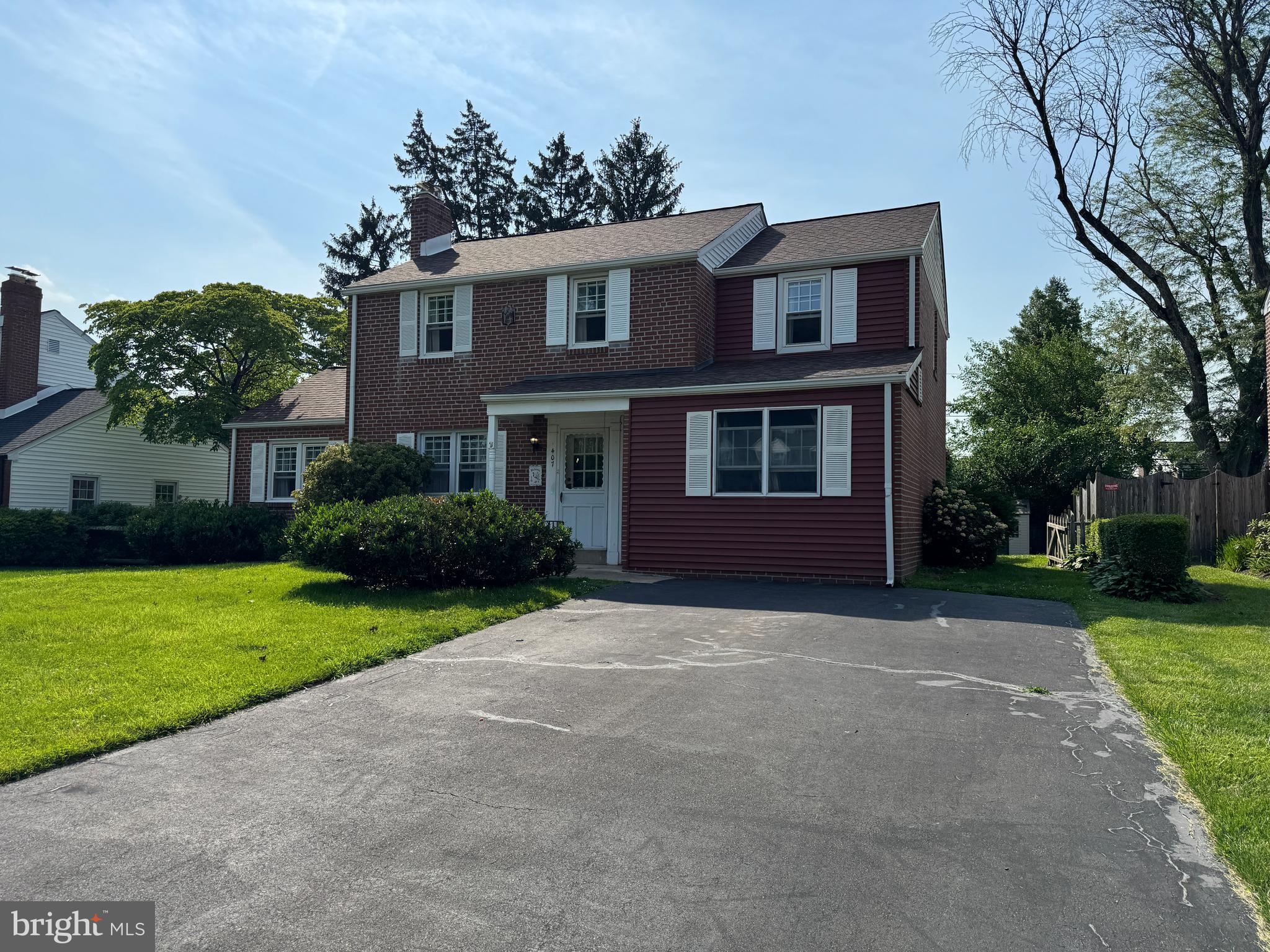 407 Willow Road Oreland, PA 19075 - Photo 3 of 30 a view of a house with a yard