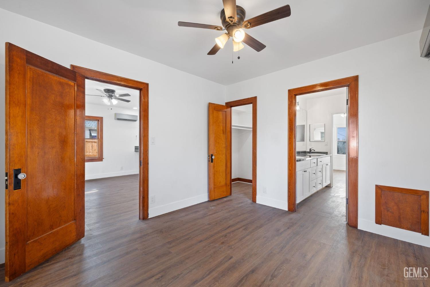 Undisclosed Address Bakersfield, CA 93308 - Photo 15 of 21 a view of empty room with wooden floor