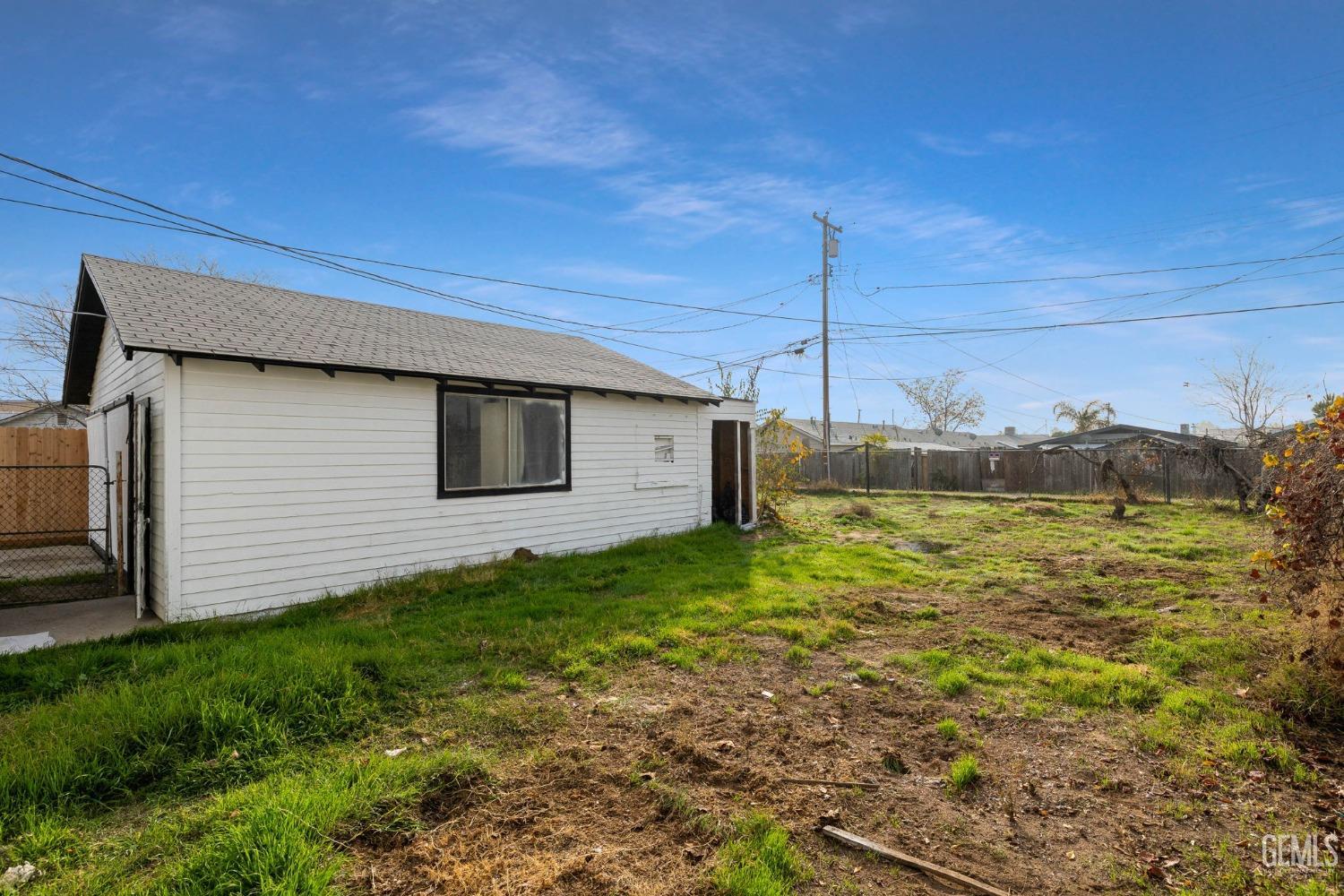 Undisclosed Address Bakersfield, CA 93308 - Photo 20 of 21 a house view with a backyard space