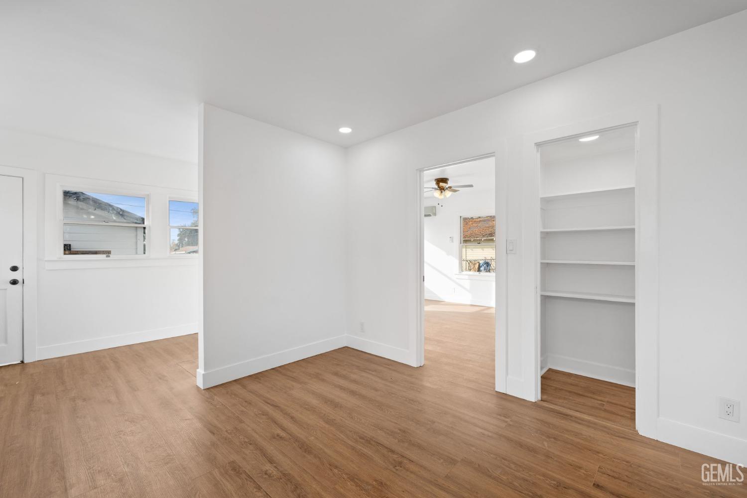 Undisclosed Address Bakersfield, CA 93308 - Photo 9 of 21 a view of an empty room with closet and a window