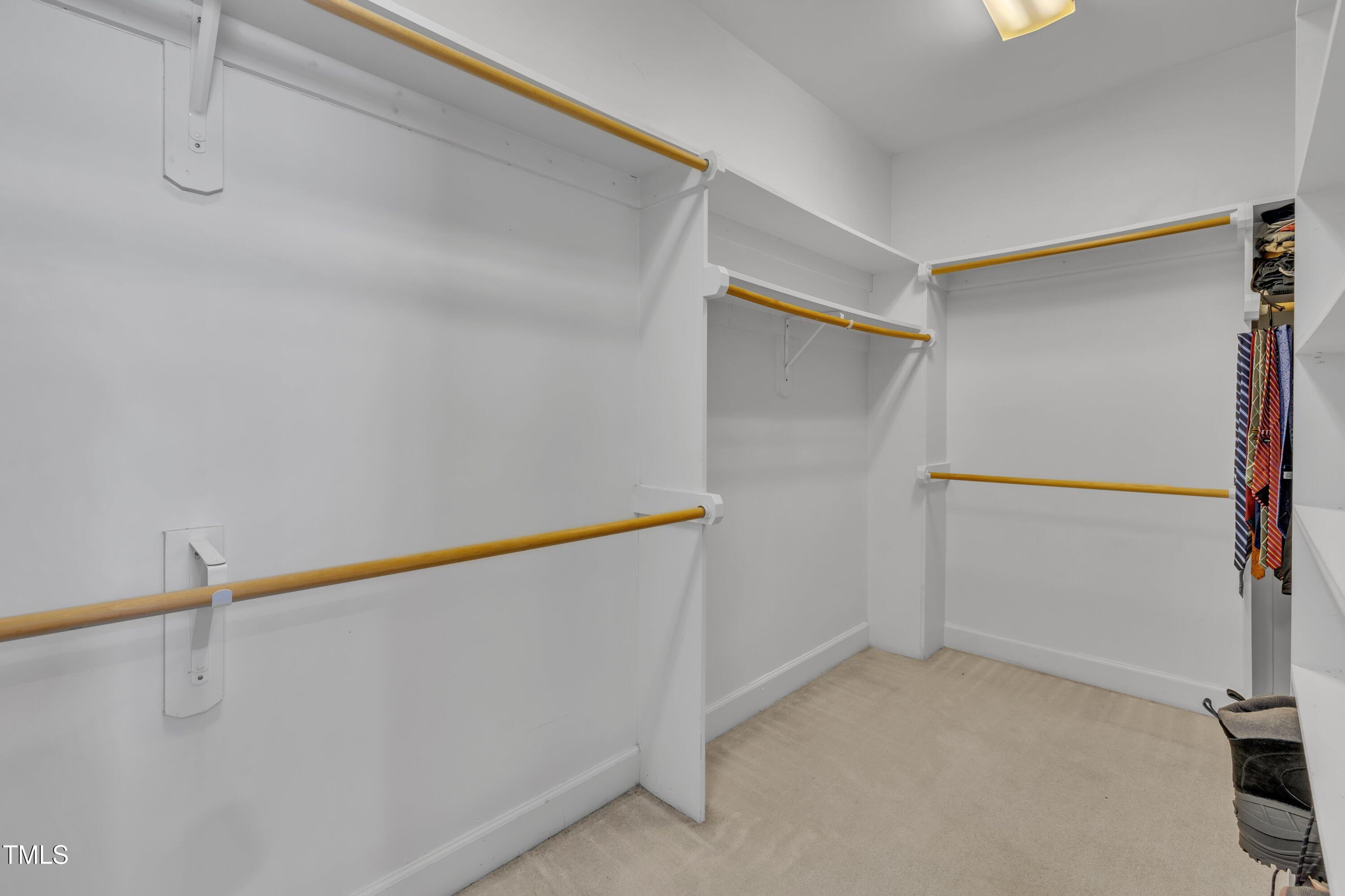 7505 Nichols Road Raleigh, NC 27615 - Photo 23 of 45 Large walk-in closet in primary bedroom