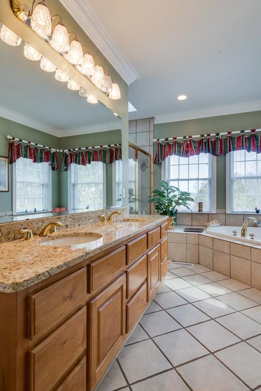 373 Gimlet Road Fayetteville, TN 37334 - Photo 11 of 29 a kitchen with stainless steel appliances granite countertop a sink and a stove