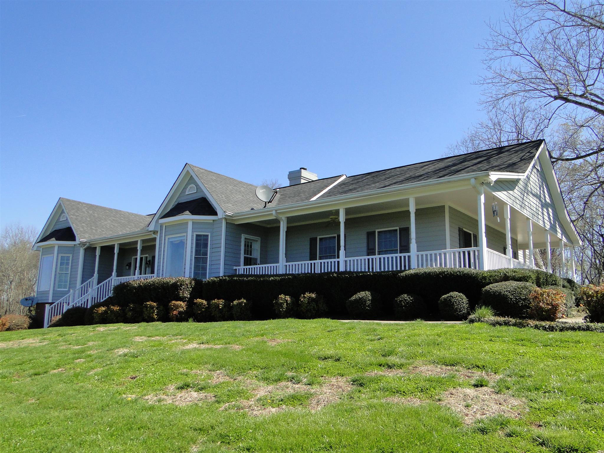 373 Gimlet Road Fayetteville, TN 37334 - Photo 2 of 29 a front view of a house with a garden