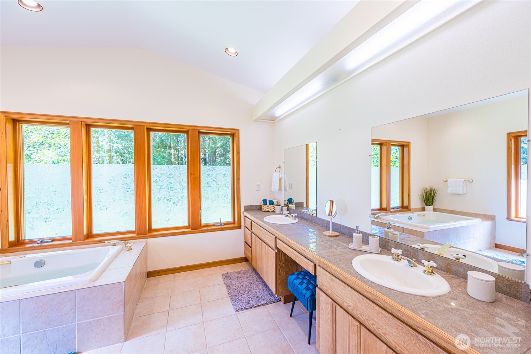 173 Pleasant Meadows Lane Beaver, WA 98305 - Photo 17 of 40 a bathroom with a granite countertop sink and a bathtub