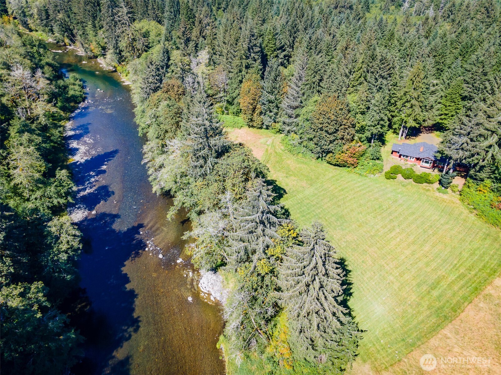 173 Pleasant Meadows Lane Beaver, WA 98305 - Photo 2 of 40 a view of lake with houses
