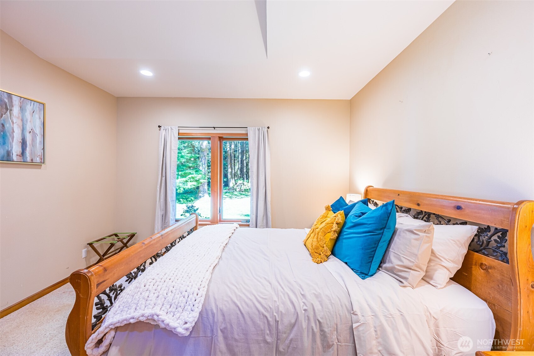 173 Pleasant Meadows Lane Beaver, WA 98305 - Photo 22 of 40 a bedroom with a bed and a window