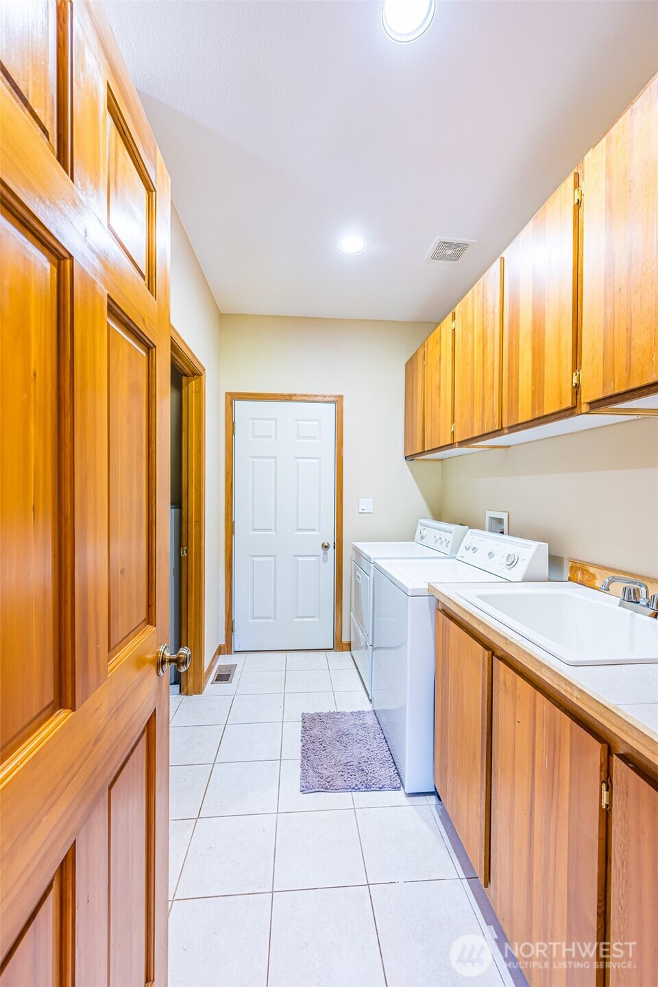 173 Pleasant Meadows Lane Beaver, WA 98305 - Photo 24 of 40 a hallway with a large window and in a kitchen