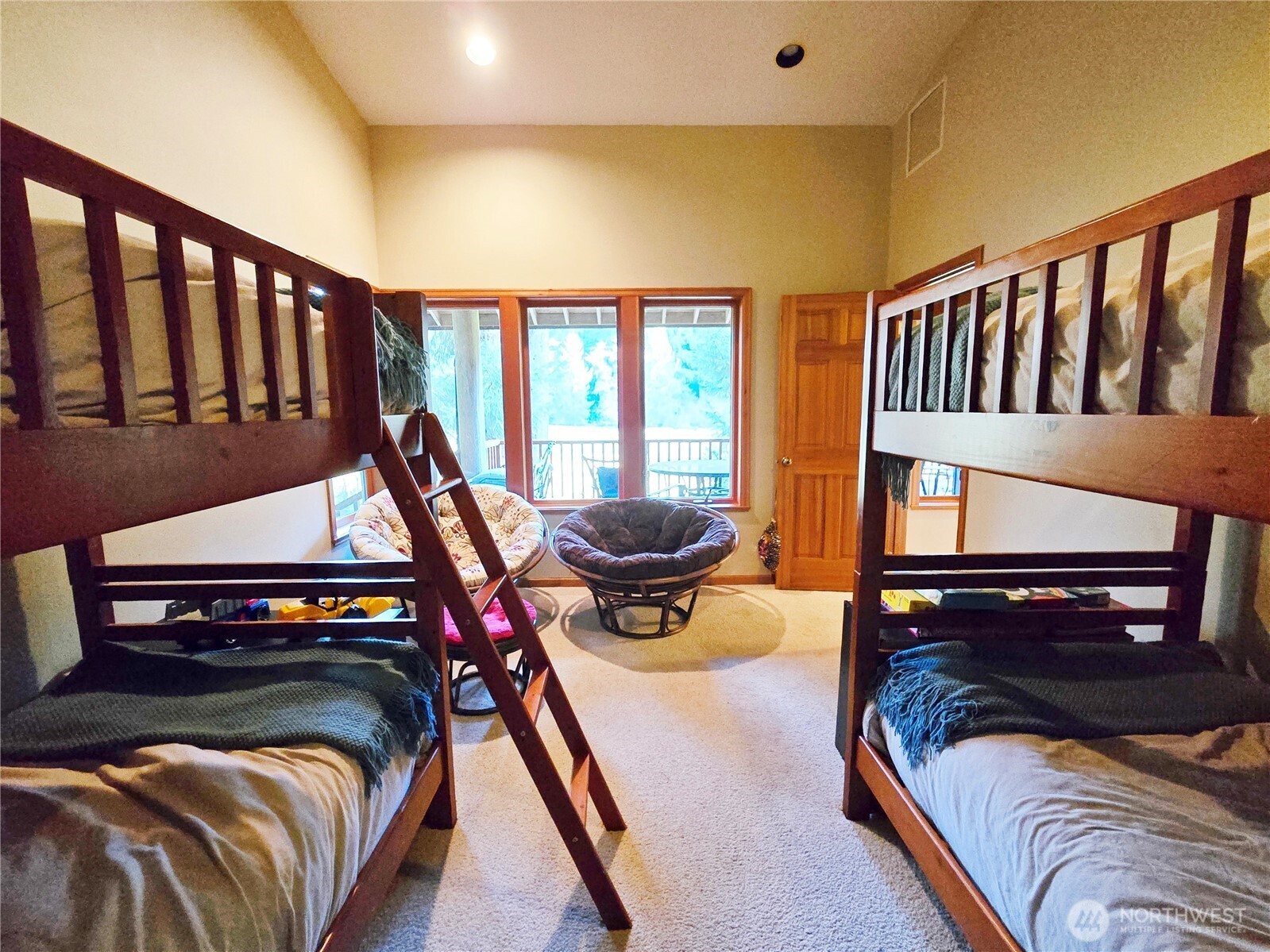 173 Pleasant Meadows Lane Beaver, WA 98305 - Photo 25 of 40 a bed sitting in a bedroom next to a window