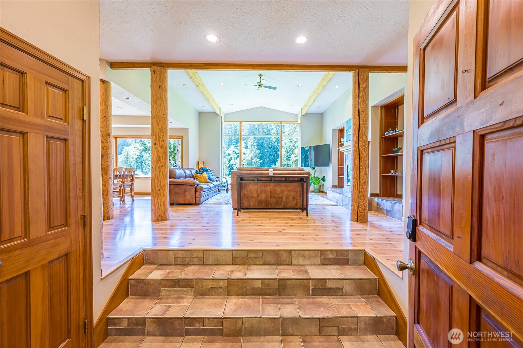 173 Pleasant Meadows Lane Beaver, WA 98305 - Photo 4 of 40 a lobby with furniture and floor to ceiling windows