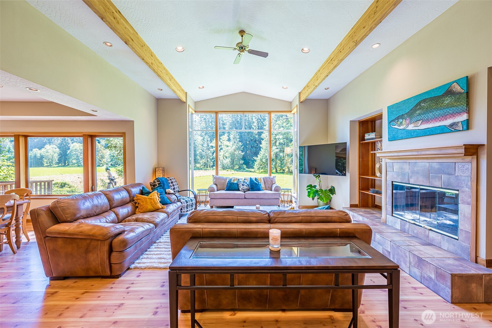 173 Pleasant Meadows Lane Beaver, WA 98305 - Photo 5 of 40 a living room with furniture fireplace and a large window