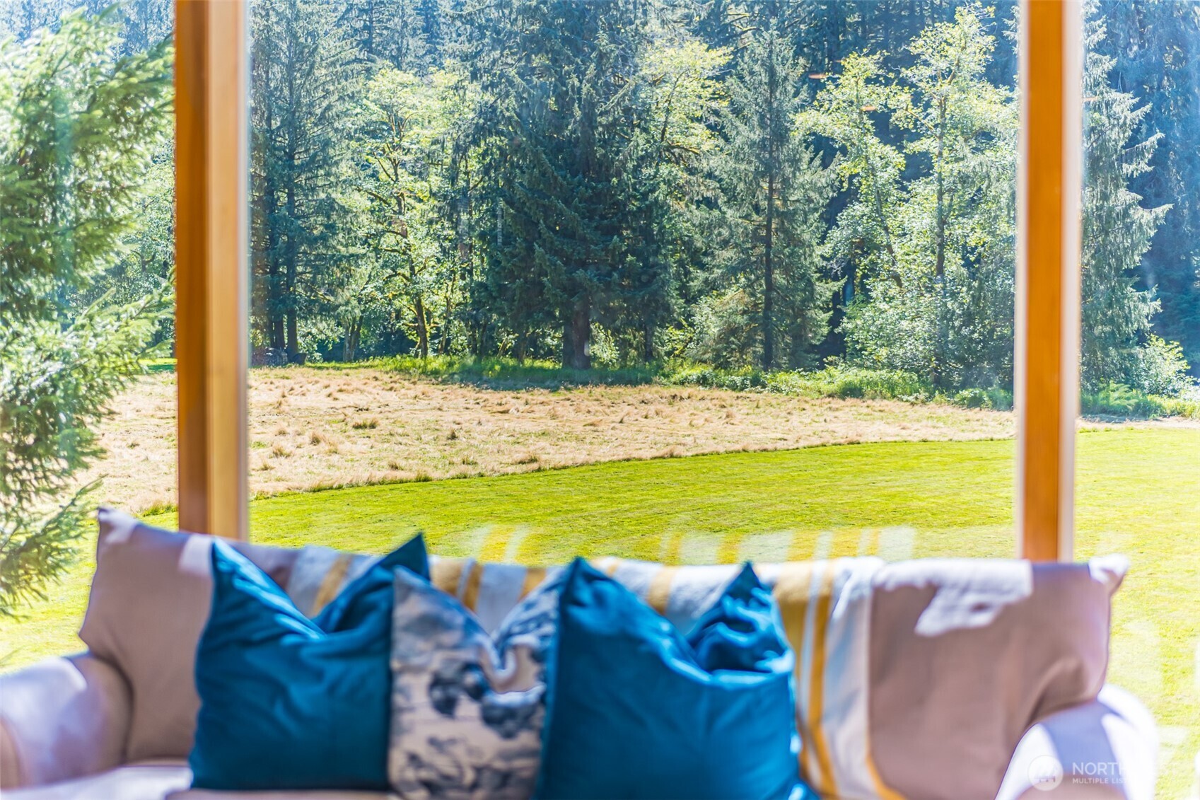 173 Pleasant Meadows Lane Beaver, WA 98305 - Photo 7 of 40 a view of a swimming pool with an outdoor seating space