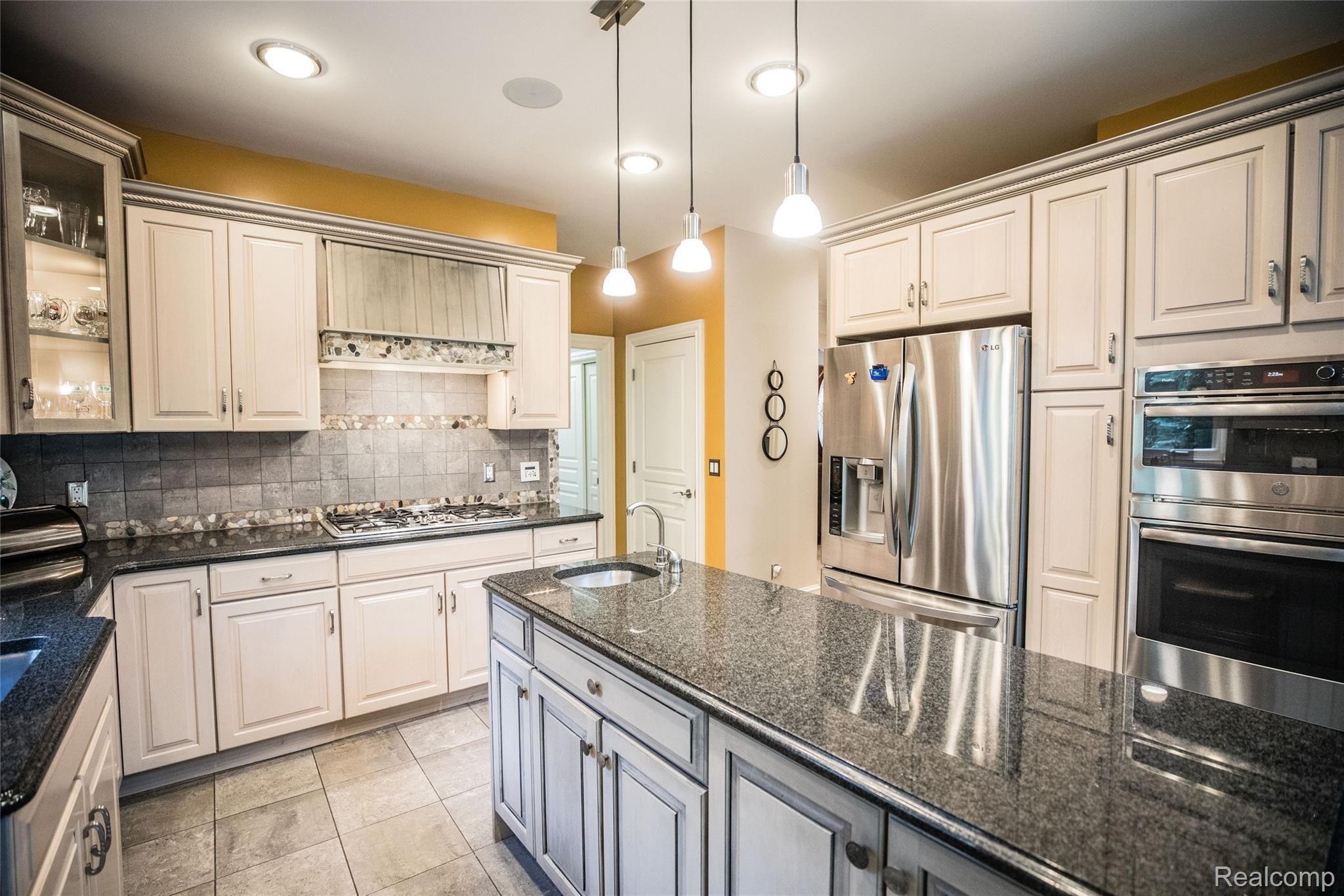 5542 Clarkston Road Clarkston, MI 48348 - Photo 20 of 85 SS APPLIANCES; DOUBLE OVEN; GAS RANGE